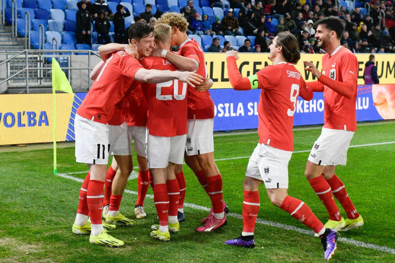 Austria's Players celebrate after scoring a goal during the international frindly soccer match between Slovakia and Austria. Pavel Neubauer/TASR/dpa