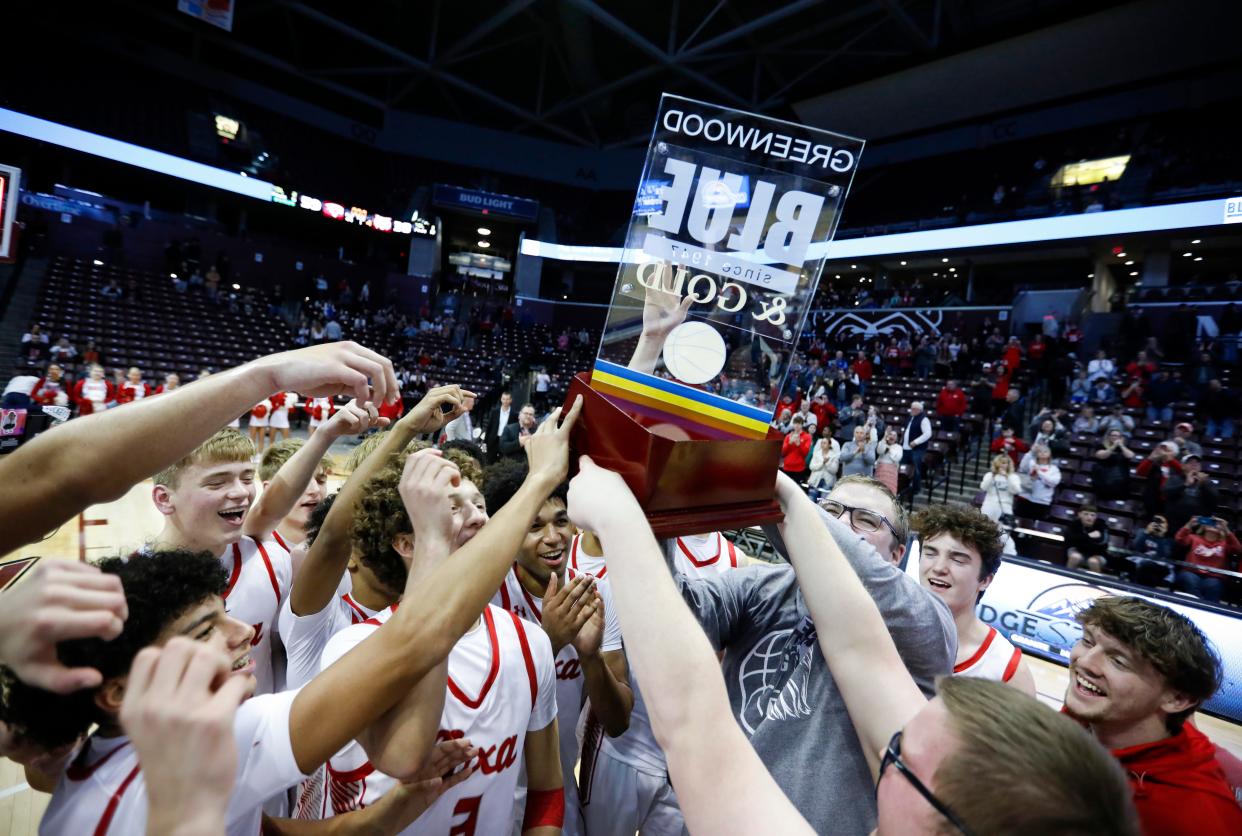 The Nixa Eagles celebrate after beating the Logan-Rogersville Wildcats in the Gold Division championship game of the 77th annual Blue & Gold Tournament at Great Southern Bank Arena on Thursday, Dec. 29, 2022.