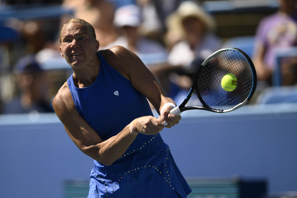 Kaia Kanepi, of Estonia, returns a shot against Liudmila Samsonova, of Russia, during a final at the Citi Open tennis tournament Sunday, Aug. 7, 2022, in Washington. (AP Photo/Nick Wass)