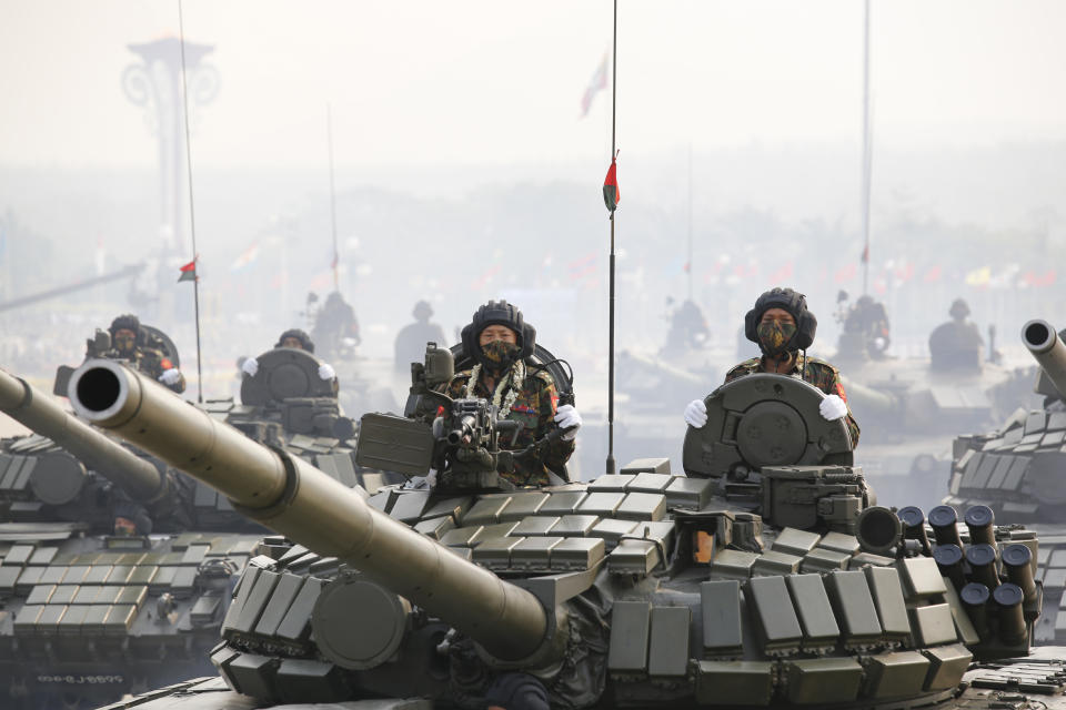 Military personnel participate in a parade on Armed Forces Day in Naypyitaw, Myanmar, Saturday, March 27, 2021. Senior Gen. Min Aung Hlaing, the head of Myanmar’s junta, on Saturday used the occasion of the country’s Armed Forces Day to try to justify the overthrow of the elected government of Aung San Suu Kyi, as protesters marked the holiday by calling for even bigger demonstrations. (AP Photo)