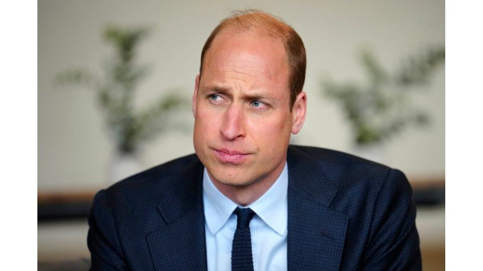 Prince William in a blue suit and tie