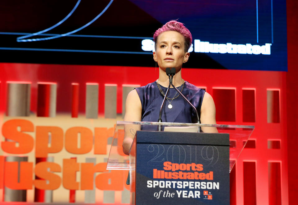 NEW YORK, NEW YORK - DECEMBER 09: Sports Illustrated Sportsperson of the Year Award Winner Megan Rapinoe speaks onstage during the Sports Illustrated Sportsperson Of The Year 2019 at The Ziegfeld Ballroom on December 09, 2019 in New York City. (Photo by Bennett Raglin/Getty Images for Sports Illustrated Sportsperson of the Year 2019)