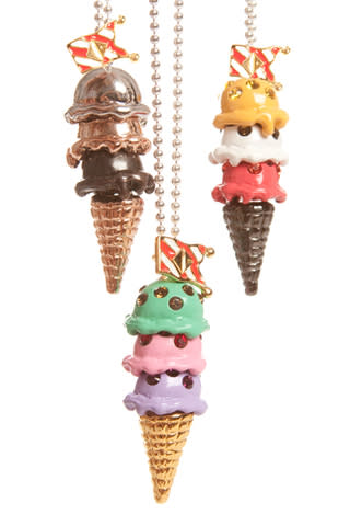 Q-POT. Wafflecone necklace ($155) and ice cream charms ($60), at Opening Ceremony