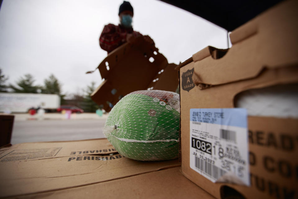 BLOOMINGTON, INDIANA, UNITED STATES - 2020/11/21: A Turkey sits ready to be distributed as members of the Indiana National Guard assist Pantry 279 food bank to distribute Thanksgiving meals at Hoosier Hills food bank. (Photo by Jeremy Hogan/SOPA Images/LightRocket via Getty Images)