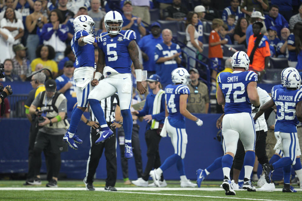 Indianapolis Colts quarterback Anthony Richardson (5) is congratulated by wide receiver Josh Downs (1) after scoring on a 2-yard run during the first half of an NFL football game against the Jacksonville Jaguars Sunday, Sept. 10, 2023, in Indianapolis. (AP Photo/Jeff Dean)
