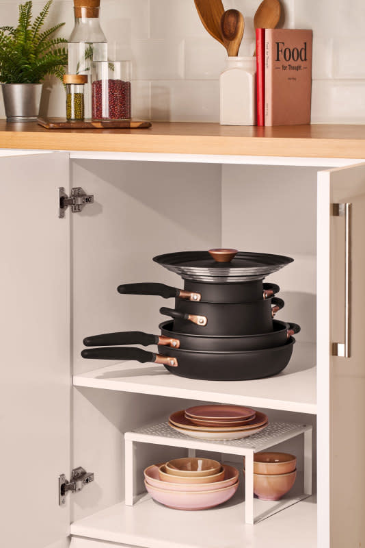 Stacking cookware neatly saves space in a small kitchen.<p>Meyer Cookware</p>