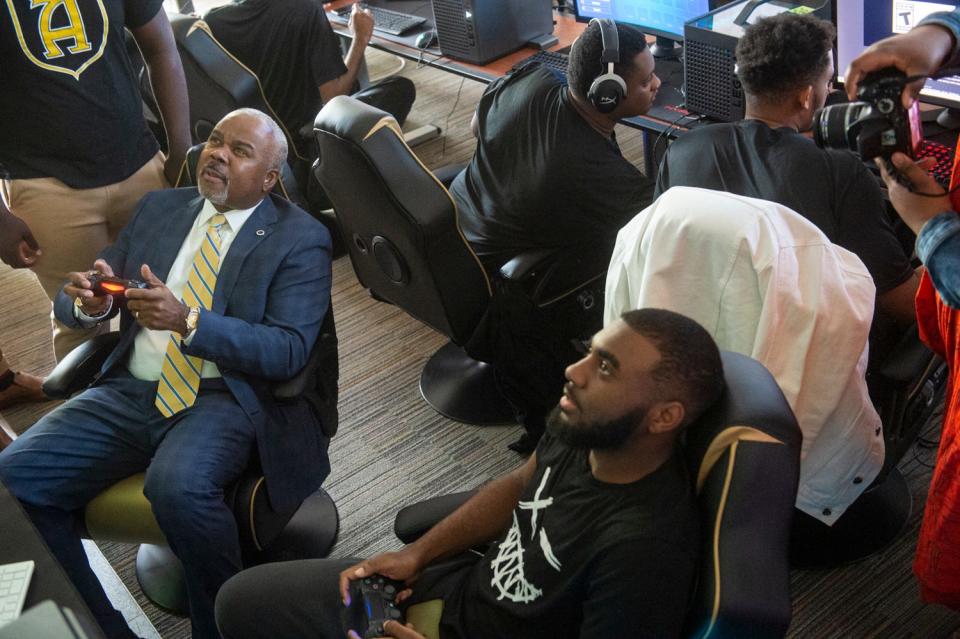 ASU President Quinton Ross plays a game during the opening of the ASU Gaming and Esports Lab at the John Garrick Hardy Center at Alabama State University in Montgomery, Ala., on Wednesday, March 8, 2023.