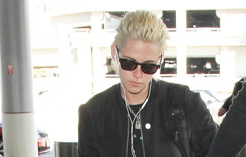 Kristen Stewart looks all sorts of biker goth chic in this all-black getup