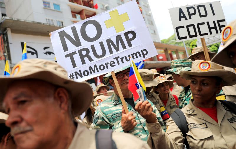 FILE PHOTO: Supporters of Venezuela's President Nicolas Maduro attend a rally against U.S. President Donald Trump in Caracas