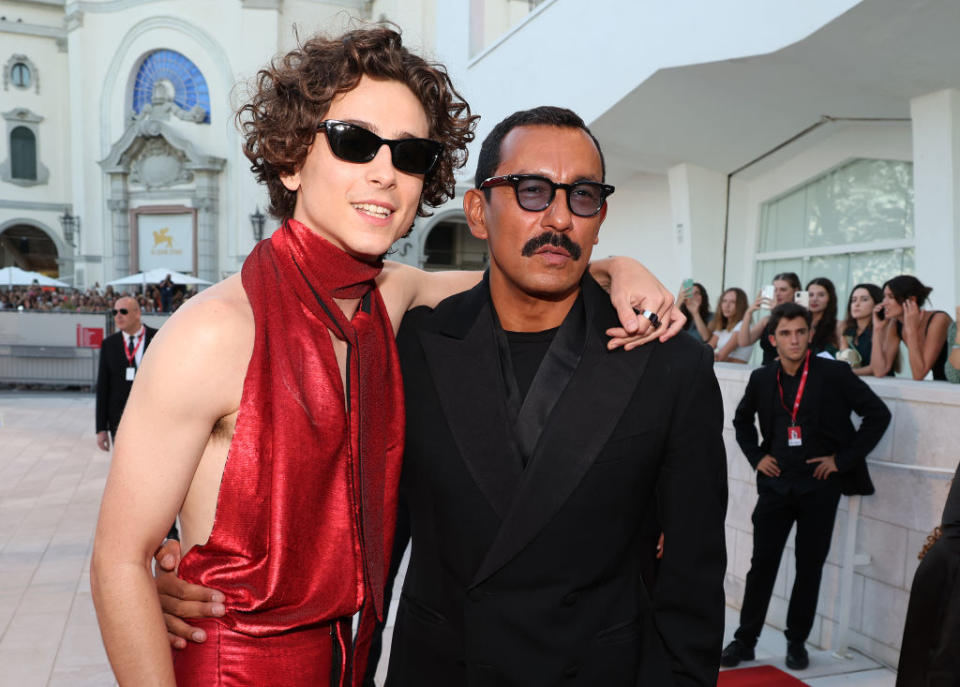 VENICE, ITALY - SEPTEMBER 02: Timothee Chalamet (L) poses with designer Haider Ackermann during the 'Bones And All' red carpet at the 79th Venice International Film Festival on September 02, 2022 in Venice, Italy. (Photo by Pascal Le Segretain/Getty Images)