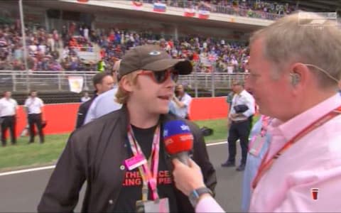 Martin Brundle speaks to Rupert Grint - Credit: SKY SPORTS F1