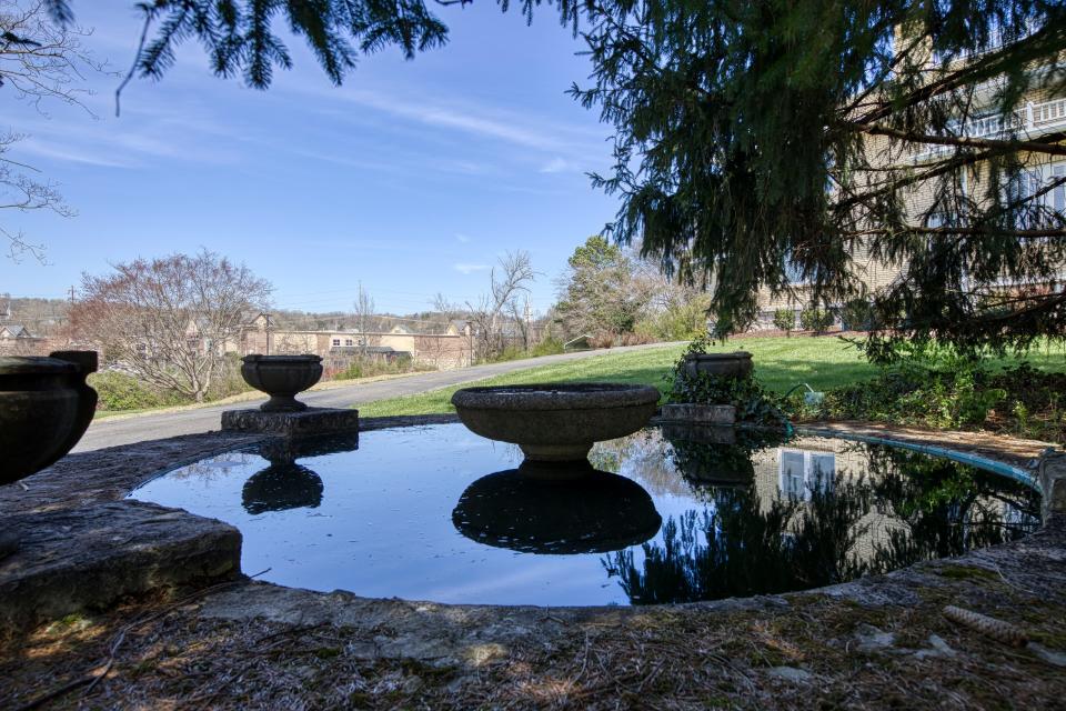 The neoclassical designed home at 2805 Gibbs Drive features a gracious front porch, porte-cochère, historic fountain and 4-car garage. Fountain City, March 21, 2023