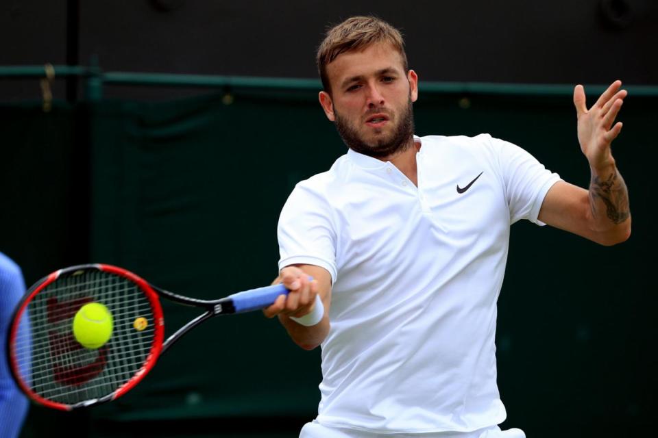 Dan Evans strikes a forehand during a match earlier in the tournament (PA)