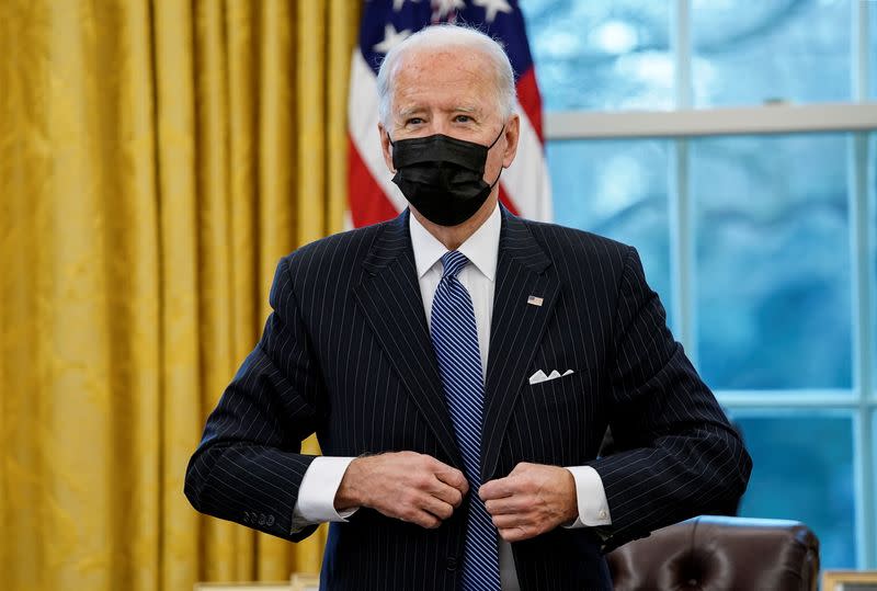 FILE PHOTO: U.S. President Biden meets with new U.S. Defense Secretary Lloyd Austin at the White House in Washington