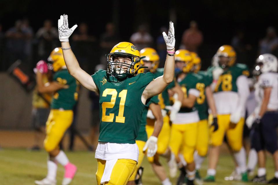 Kingsburg's Wyatt Boyd celebrates a touchdown against CVC during their high school football game in Kingsburg, Calif., Friday, Oct. 14, 2022.