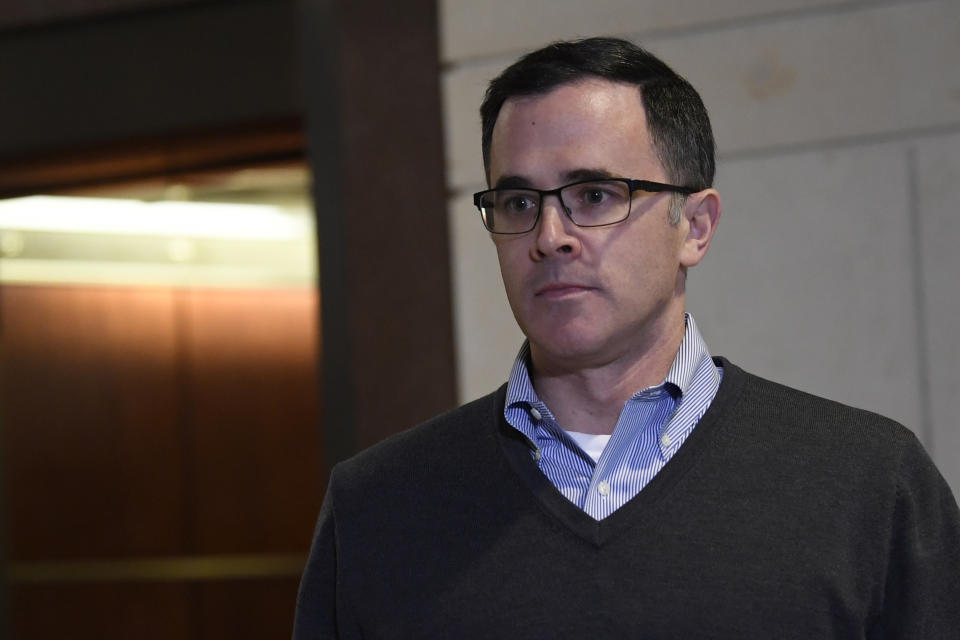 Tim Morrison, the top Russia official on President Trump's National Security Council, gets off of an elevator as he returns to Capitol Hill in Washington, Wednesday, Nov. 6, 2019, to review his testimony before the House impeachment inquiry last week. (AP Photo/Susan Walsh)