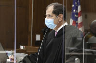 Orange County Superior Court Judge Larry Yellin presides over a hearing for Marcus Anthony Eriz and Wynne Lee at the Central Justice Center in Santa Ana, Calif., Friday, June 18, 2021. Eriz, 24, charged with the murder of a 6-year-old boy in a road rage incident was ordered held without bail Friday. Eriz, and Lee, both pleaded not guilty to the charges they face through their attorneys. Lee, is charged with being an accessory after the fact, and the judge requested more information before setting her bail. (Frederick M. Brown/Pool via AP)