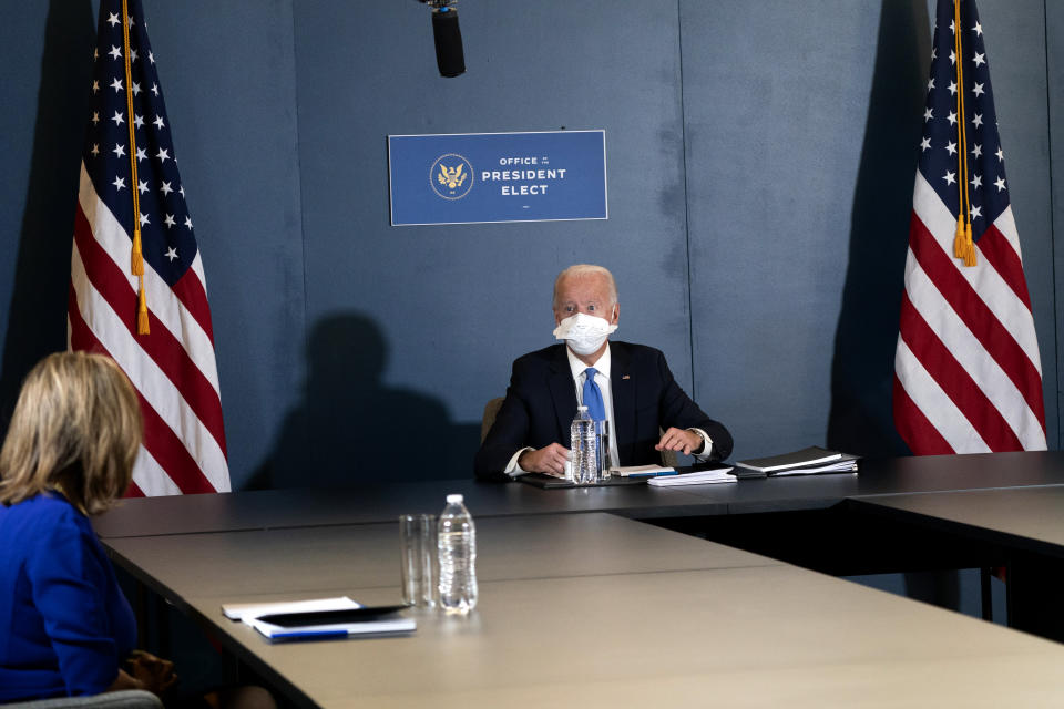 President-elect Joe Biden, speaks during a meeting with Vice President-elect Kamala Harris, Senate Minority Leader Chuck Schumer of N.Y., and House Speaker Nancy Pelosi of Calif., left, Friday, Nov. 20, 2020, in Wilmington, Del. (AP Photo/Alex Brandon)