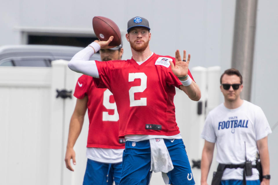 Carson Wentz, getting loose at Colts OTAs. (Trevor Ruszkowski/USA TODAY Sports)