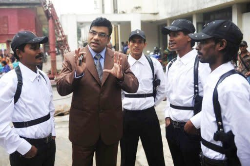 Misha Shawdagar (C) on the set of his new movie in Dhaka. Last year Shawdagar had five blockbusters -- the best tally by any local actor -- and he still insists on doing many of his own stunts