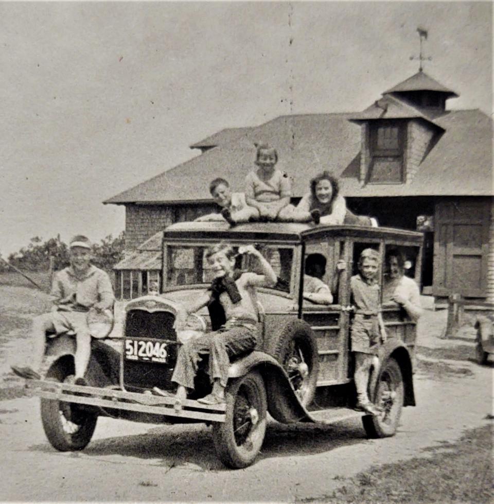 A car full of kids at the Davis-Douglas Farm circa 1933. Sam Chapin's mother is sitting on top of the car.