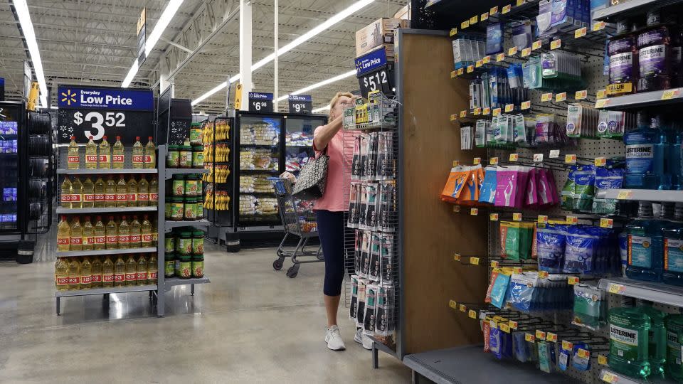 A customer shops at a Walmart Supercenter on February 20, 2024 in Hallandale Beach, Florida.  -Joe Raedle/Getty Images