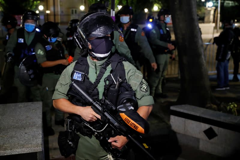 Protest to mark the first anniversary of an attack in a train station by an armed crowd wearing white shirts, demanding justice for the victims of violence and broader freedoms, at a shopping mall in Hong Kong's Yuen Long