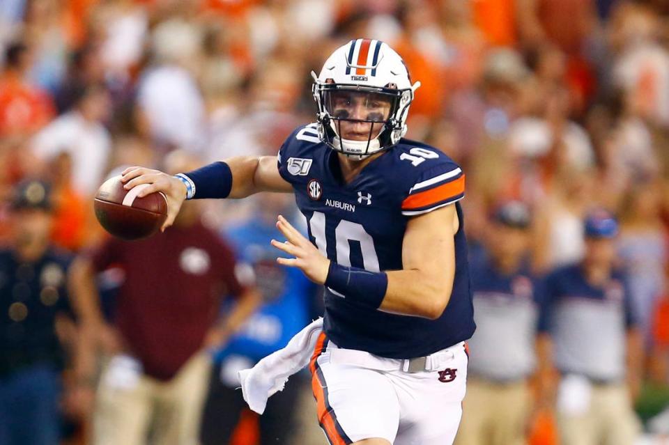 Auburn quarterback Bo Nix (10) rolls out to pass during the first half of an NCAA college football game against Mississippi State, Saturday, Sept. 28, 2019, in Auburn, Ala. (AP Photo/Butch Dill)