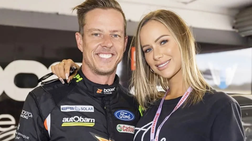 Pictured here, Supercars driver James Courtney and girlfriend Teagan Woodford pose for a photo.