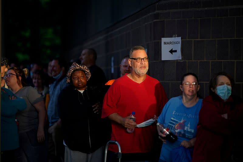 FILE PHOTO: People line up outside Kentucky Career Center in Frankfort