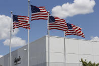 <p>American flags fly outside of the FlagSource facility in Batavia, Illinois, U.S., on Tuesday, June 27, 2017. (Photo: Jim Young/Bloomberg via Getty Images) </p>