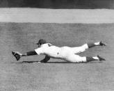 <p><strong>October 15, 1969</strong>: Ron Swoboda, a weak outfielder with limited range, helped his Miracle Mets win Game 4 of the 1969 World Series thanks to a magnificent catch. "It's the single greatest play I've ever seen," says Thorn. In the top of the ninth inning, Orioles slugger Brooks Robinson hits a sinking line drive to right field. Swoboda could have badly misplayed it to give the Orioles the lead, but instead he makes the diving catch, rolls over, pops up, and throws home to keep the game tied. "This is such an implausible candidate for a great catch, and the situation is such that by preserving the tie, he permitted the Mets to go into extra innings and win," Thorn says.<br></p>