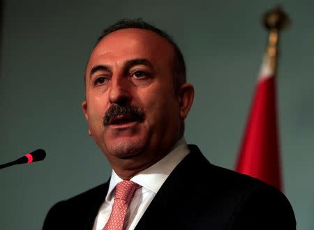 Turkish Foreign Minister Mevlut Cavusoglu speaks during a news conference with the Adviser to Pakistan's Prime Minister on National Security and Foreign Affairs, Sartaj Aziz at the Foreign Ministry in Islamabad, Pakistan, August 2, 2016. REUTERS/Faisal Mahmood