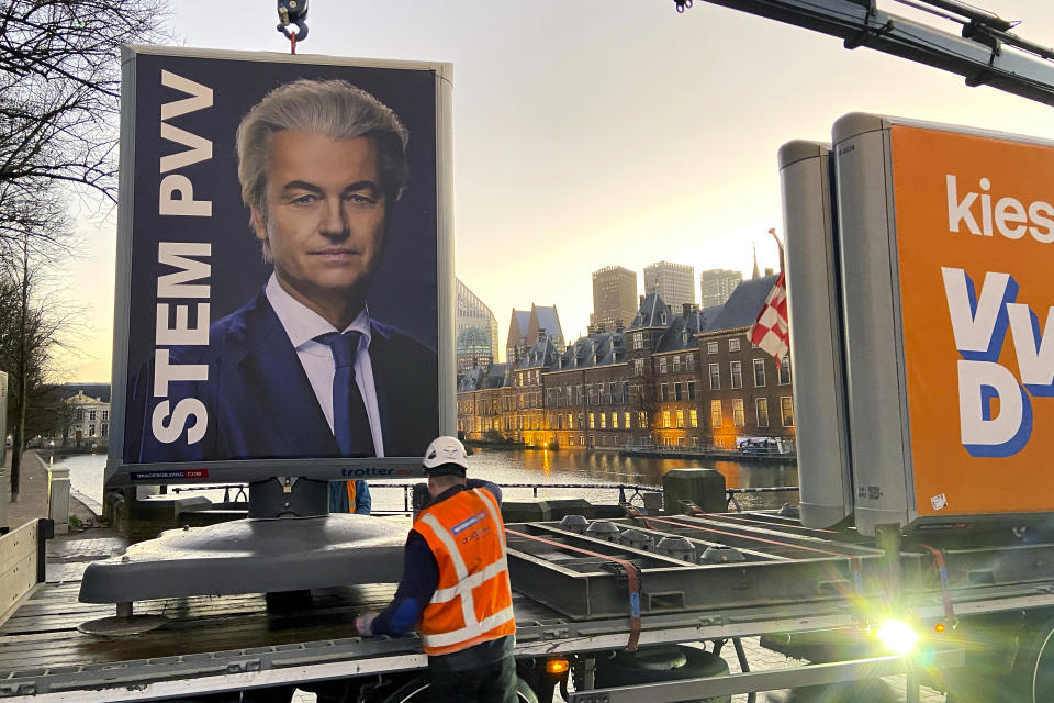 An eclection campaing poster of Geert Wilders' PVV party is removed in The Hague, Netherlands, Thursday, Nov. 23, 2023. The far-right and anti-Islam populist Geert Wilders is heading for a massive parliamentary election victory. It's one of the biggest political upsets in Dutch politics since World War II and one that is bound to send shockwaves through Europe. (AP Photo/Aleksandar Furtula)