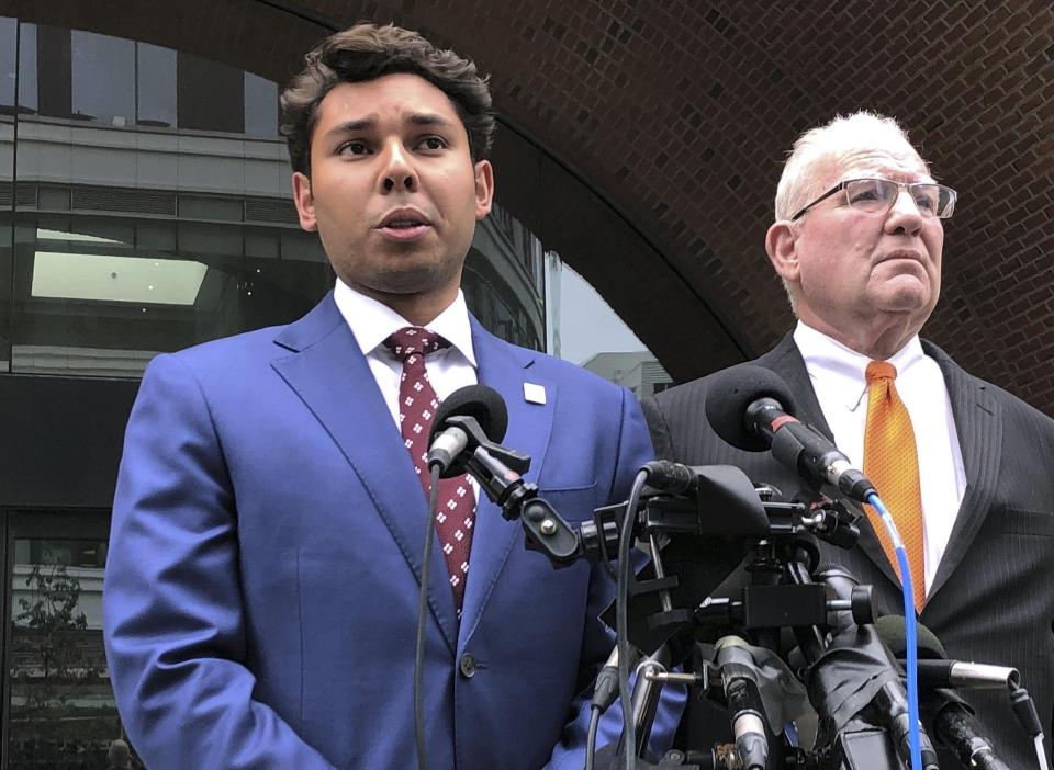 Former Fall River mayor Jasiel Correia, left, is seen here in this file photo with defense attorney Kevin Reddington outside the federal courthouse in Boston.