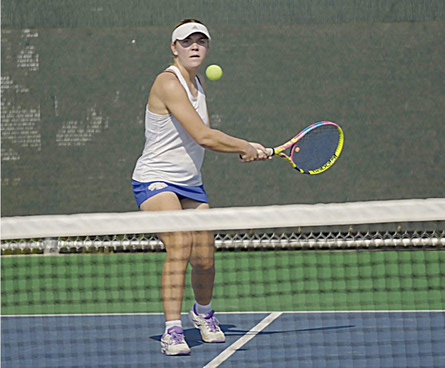 Aberdeen Central's Reese Comstock hits a backhand shot during singles play during the opening day of the state Class AA high school girls tennis tournament on Thursday, Oct. 10, 2024 at Rapid City.