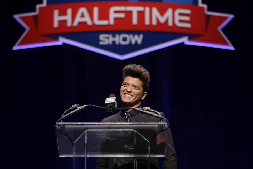 Bruno Mars who will headline the half-time show at the NFL Super Bowl XLVIII football game speaks during a press conference Thursday, Jan. 30, 2014, in New York. (AP Photo)