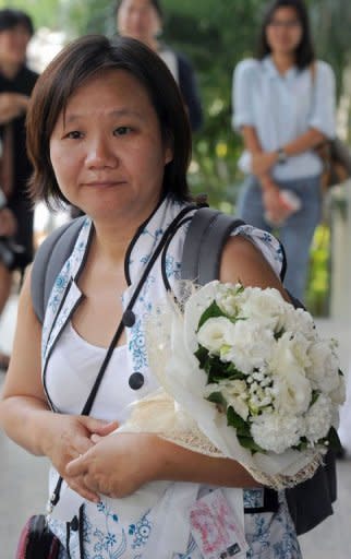 Editor of the popular Prachatai news website, Chiranuch Premchaiporn, pictured outside the Criminal Court in Bangkok, on April 30. The court postponed giving its verdict in the closely-watched trial of the editor, accused over remarks about the monarchy posted by other people on her website