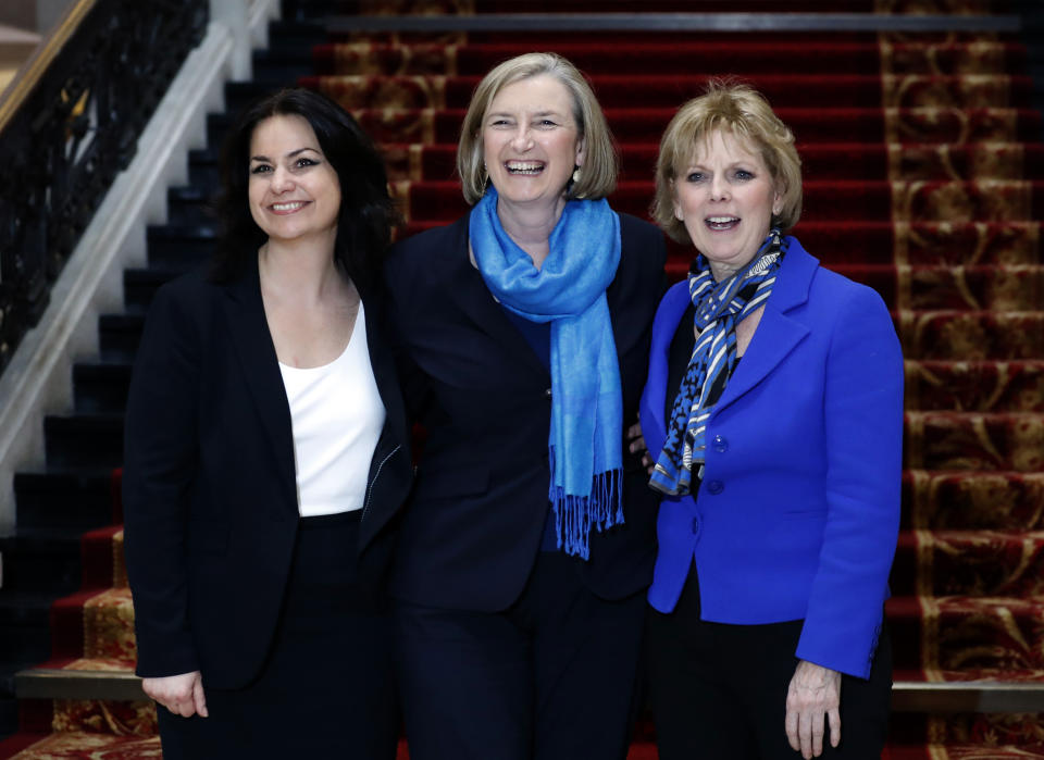 British politicians Heidi Allen, left, Sarah Wollaston, centre, and Anna Soubry, right, joined new political party 'The Independent Group' pose for a photograph after a press conference in Westminster in London, Wednesday, Feb. 20, 2019. Cracks in Britain's political party system yawned wider Wednesday, as three pro-European lawmakers - Soubry, Allen and Wollaston - quit the governing Conservatives to join a newly formed centrist group of independents who are opposed to the government's plan for Britain's departure from the European Union (AP Photo/Alastair Grant)