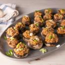 <p>If you are looking for an easy appetiser, sausage stuffed mushrooms are the perfect thing. They come together in less than hour and everyone loves the cheesy filling. For easy prep, stuff the mushrooms beforehand and bake off right before you plan to serve them. So simple! </p><p>Get the <a href="https://www.delish.com/uk/cooking/recipes/a34516636/sausage-stuffed-mushrooms-recipe/" rel="nofollow noopener" target="_blank" data-ylk="slk:Sausage Stuffed Mushrooms;elm:context_link;itc:0;sec:content-canvas" class="link ">Sausage Stuffed Mushrooms</a> recipe.</p>