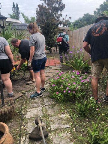 Florida police officers spent hours of their own time cleaning a cancer patient's yard. (Photo: Collier County Sheriff's Office)