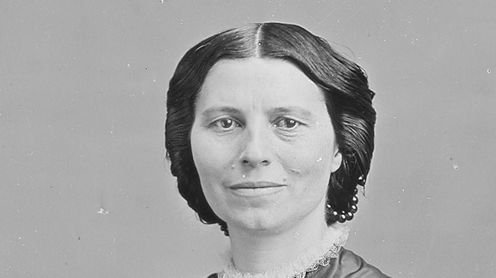 clara barton looking ahead and smiling for a photo