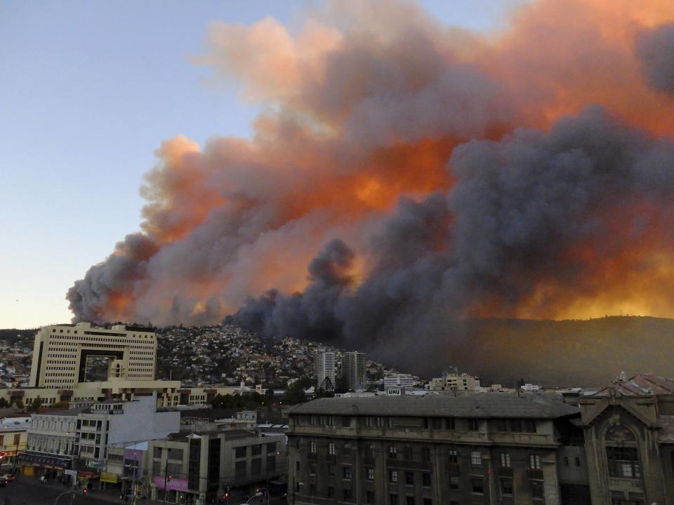 Smoke from a forest fire is seen in Valparaiso city