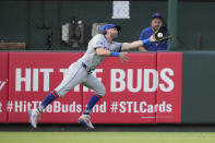 New York Mets left fielder Jeff McNeil dives and catches a fly ball by St. Louis Cardinals' Ivan Herrera during the second inning of a baseball game Monday, May 6, 2024, in St. Louis. (AP Photo/Jeff Roberson)