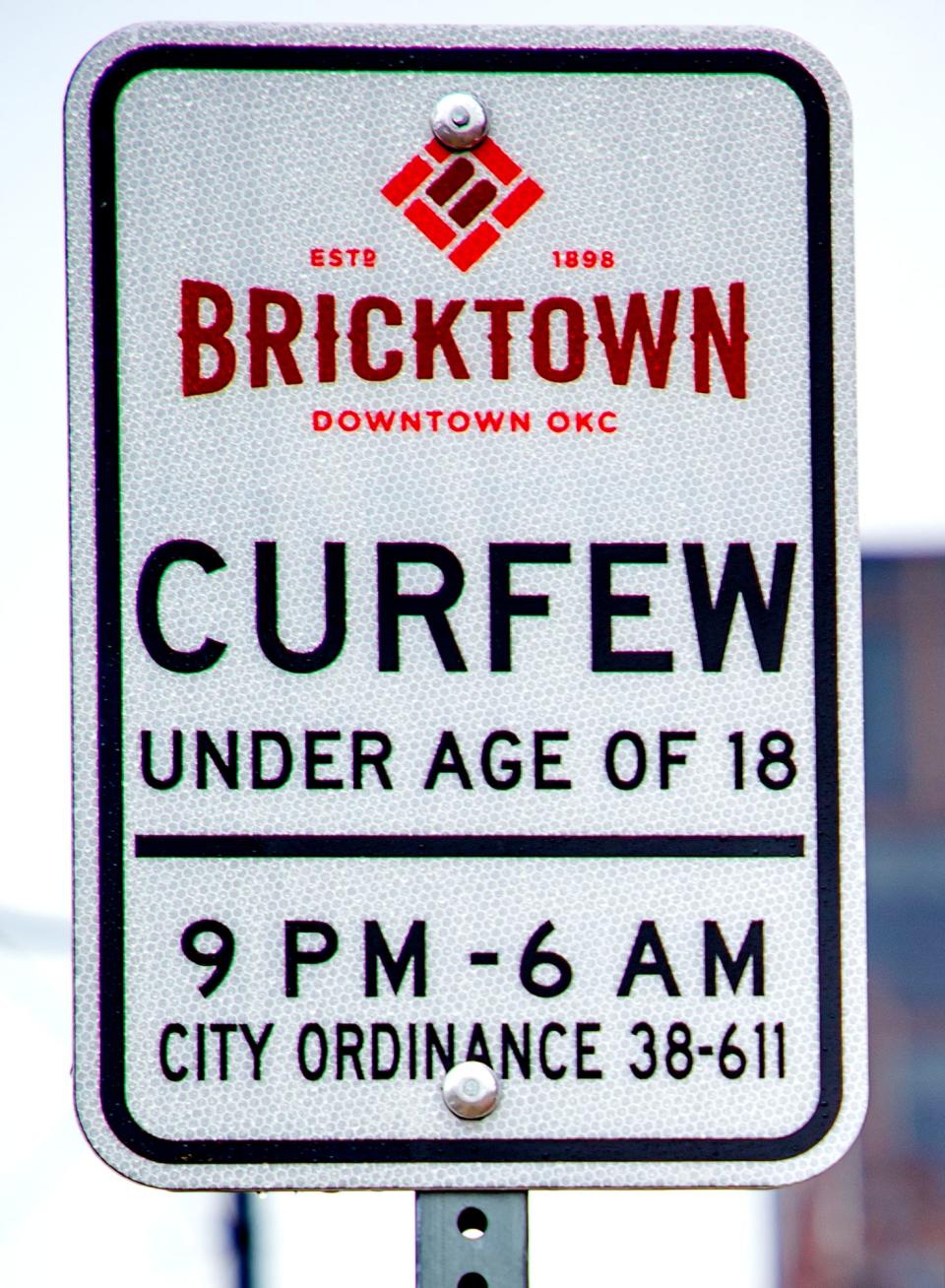 A Bricktown curfew sign is pictured March 9 in Oklahoma City.