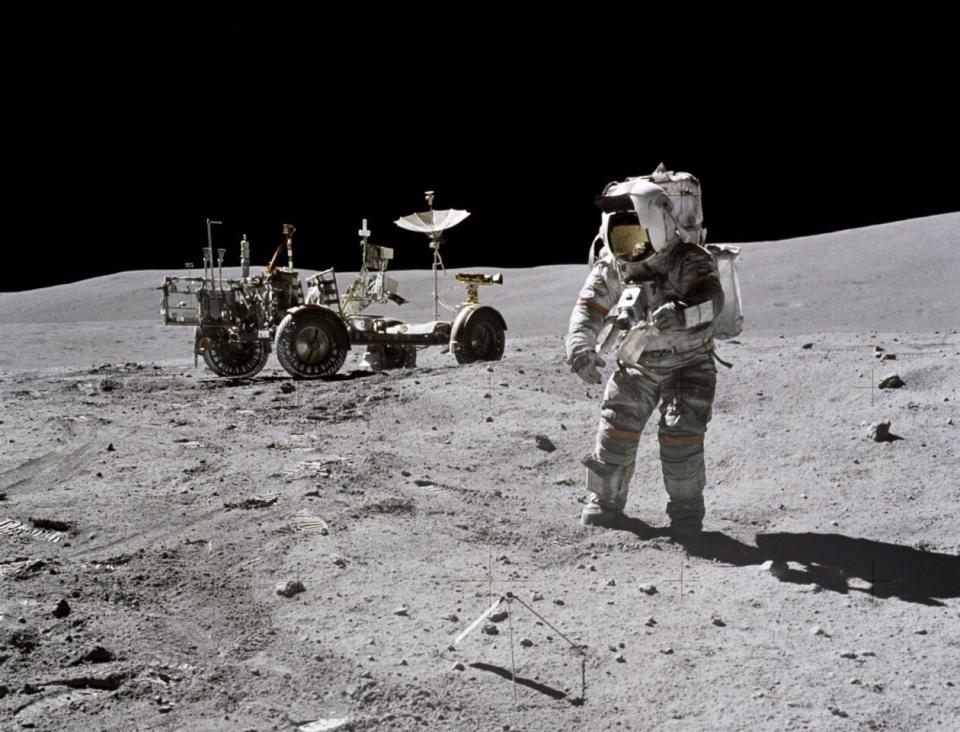 Astronaut John Young and lunar rover