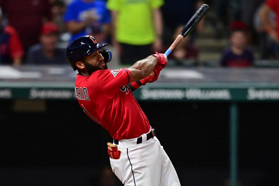 Cleveland Guardians' Amed Rosario hits an RBI-single to drive in Will Benson during the 10th inning of a baseball game against the Arizona Diamondbacks, Monday, Aug. 1, 2022, in Cleveland. (AP Photo/David Dermer)