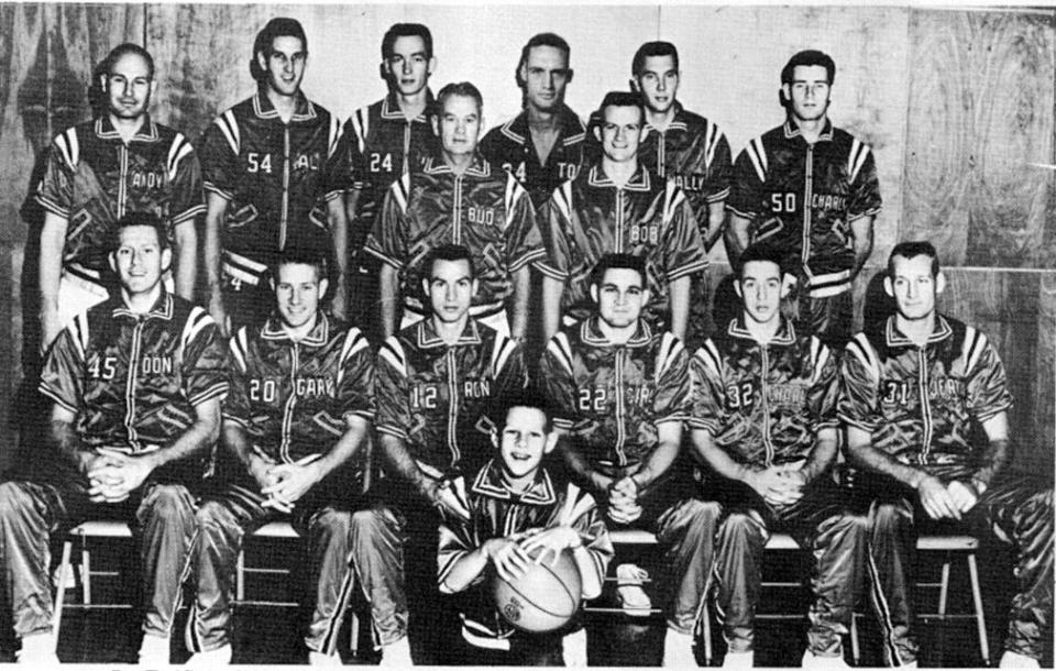 Members of the 1961-62 Phillips 66ers basketball team included, from left: Standing — Andy Likens (mgr.), Al Bunge, Jim Hagan, Bud Browning (head coach), Tom Robitaille, Bobby Plump (assistant coach), Wally Frank and Charlie McNeil); and, Sitting — Don Kojis, Gary Thompson, Ron Altenberg, Carl Cole, Charlie Bowerman and Jerry Shipp. This team won the AAU National championship.