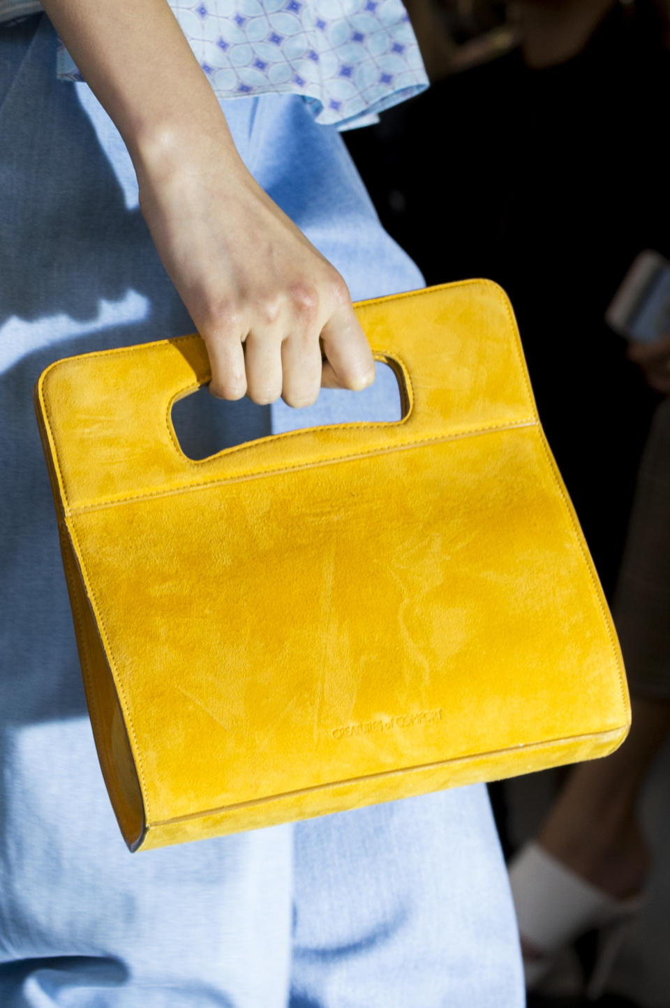 <p><i>Yellow suede handbag from the SS18 Creatures of Comfort collection. (Photo: ImaxTree) </i></p>