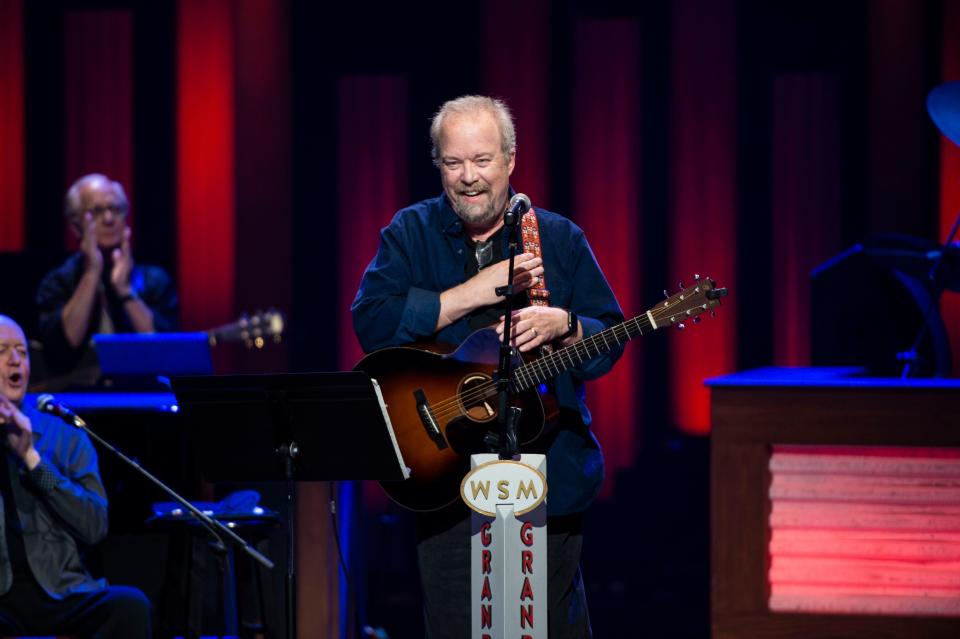 Don Schlitz reacts after being invited to become a member of the Grand Ole Opry at Grand Ole Opry House in Nashville , Tenn., Saturday, June 11, 2022.